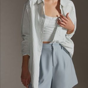 On trend very stylish oversized button up by Anthropologie